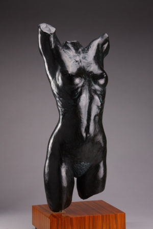 Entitled Jennifer, this is a photograph depicting a life-size bronze sculpture of a standing female figure, created by sculptor Blake Ward