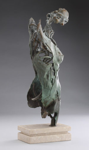 Entitled Angel Vohamanah, this is a bronze sculpture of a partial female figure with an exposed interior structure created by sculptor Blake Ward.