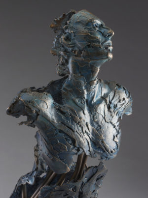 Entitled Angel Afriel, this is a bronze sculpture of a partial male figure with an exposed interior structure created by sculptor Blake Ward.